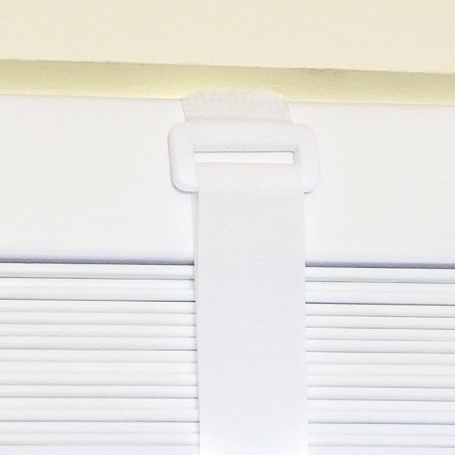https://envisionedproducts.com/cdn/shop/products/CinchStrap_White_Blinds.jpg?v=1620848524